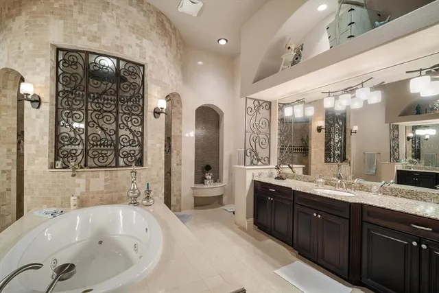 a utility room with sink dryer and washer