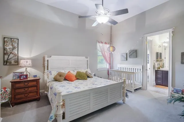 a view of a balcony with furniture and a floor to ceiling window