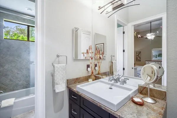 a view of a chairs and table in the patio