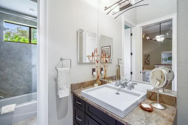 a view of a chairs and table in the patio