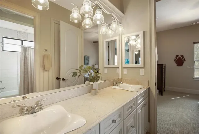a view of a patio with table and chairs