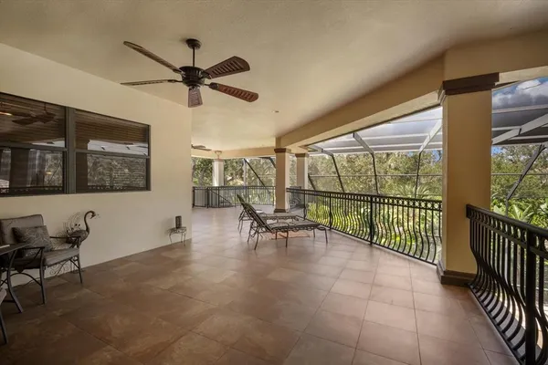 a picture of a room with a white wall and a painting