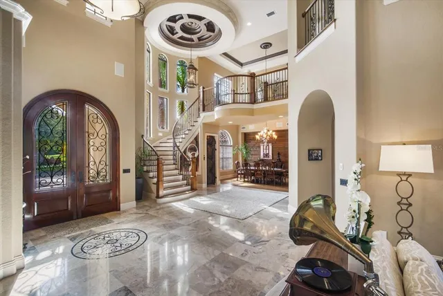 a view of an entryway with wooden floor