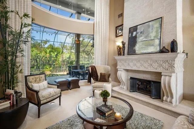 a kitchen with stainless steel appliances granite countertop a sink a stove and cabinets