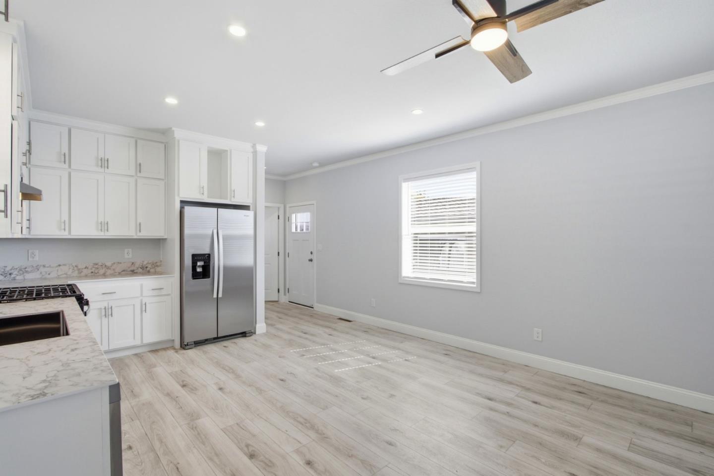 2150 Monterey Road, Unit 87 San Jose, CA 95112 - Photo 10 of 25 a view of a kitchen with a sink and a refrigerator