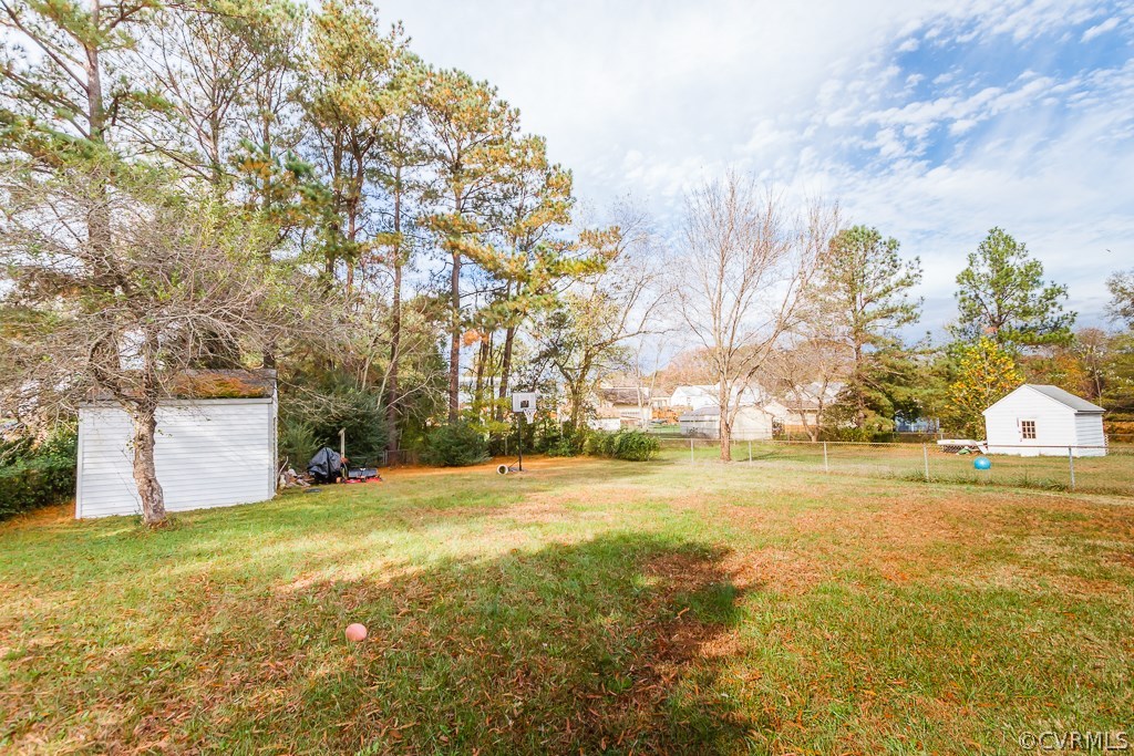 6332 Barrister Road Chesterfield, VA 23832 - Photo 22 of 24 a view of yard with swimming pool and trees
