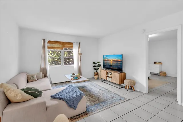 a kitchen with cabinets oven and a sink