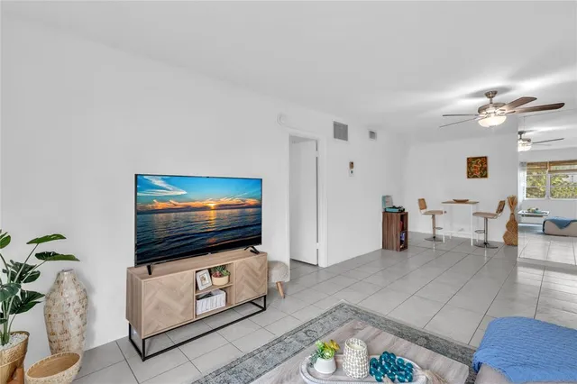 a bedroom with a bed and a view of bathroom