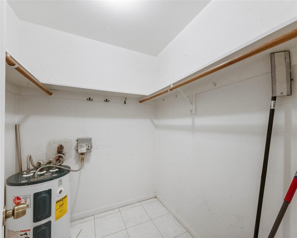 1950 North Andrews Avenue, Unit 210D Wilton Manors, FL 33305 - Photo 32 of 52 a room with storage and utility