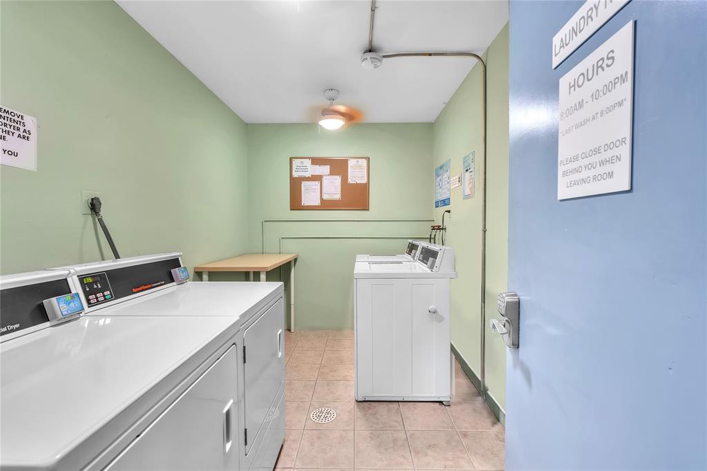 1950 North Andrews Avenue, Unit 210D Wilton Manors, FL 33305 - Photo 36 of 52 a bathroom with a sink and a mirror