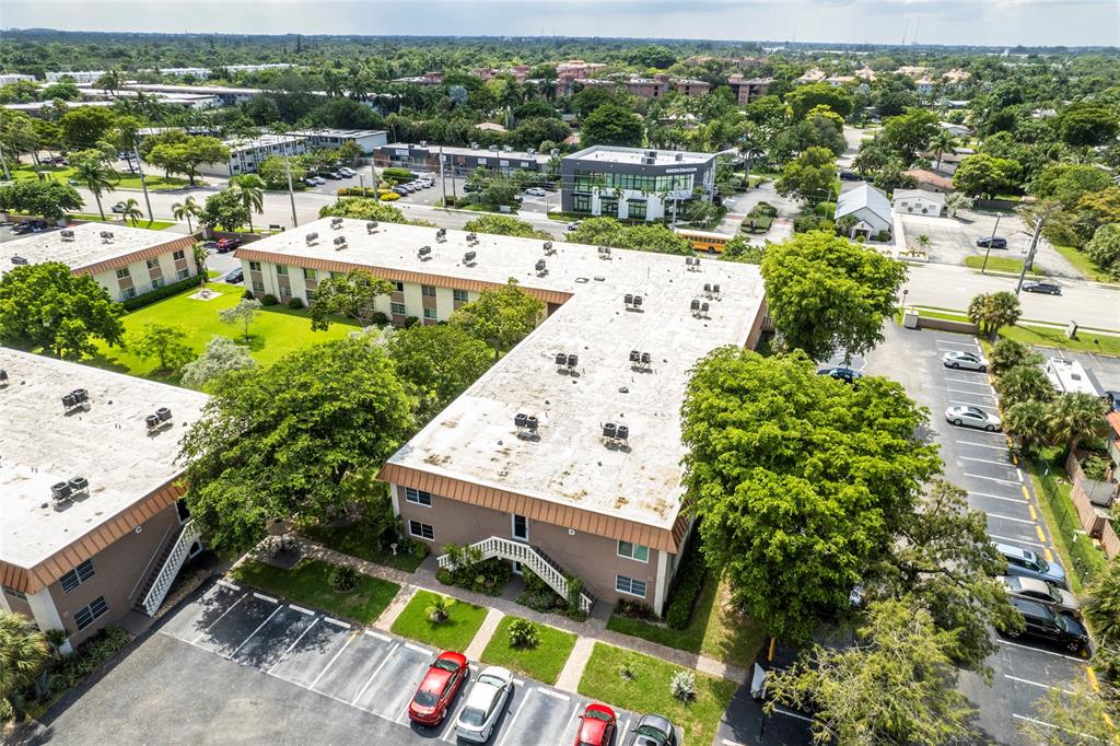 1950 North Andrews Avenue, Unit 210D Wilton Manors, FL 33305 - Photo 38 of 52 an aerial view of a house with a big yard
