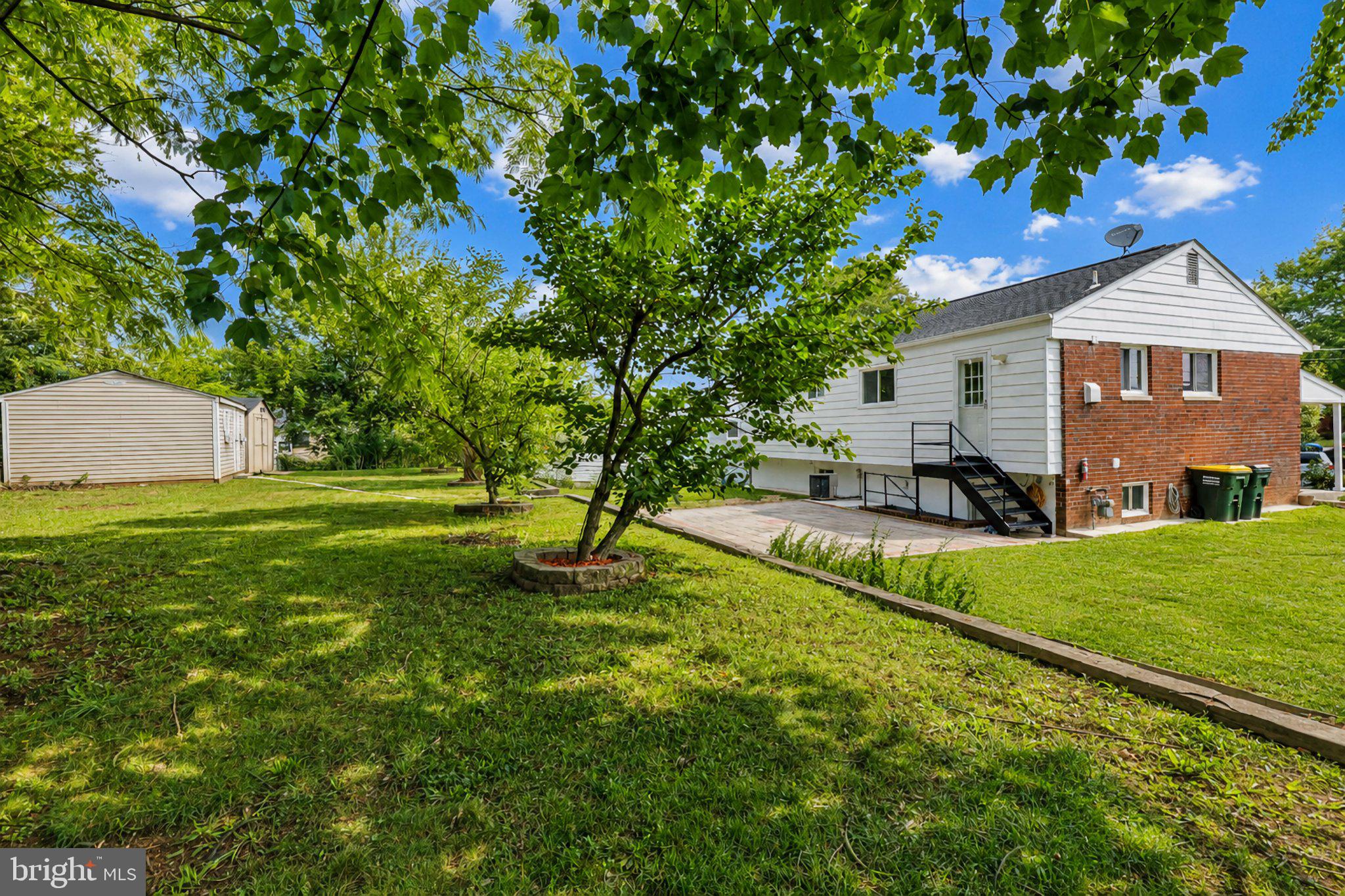 5712 Ash Drive Springfield, VA 22150 - Photo 33 of 38 Charming home with lush greenery.