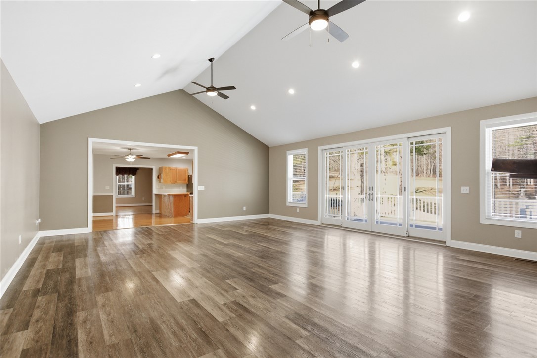 196 Flyroot Trail Pickens, SC 29671 - Photo 9 of 48 This bright living area features vaulted ceilings and ample natural light.