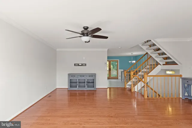 a view of a livingroom with wooden floor