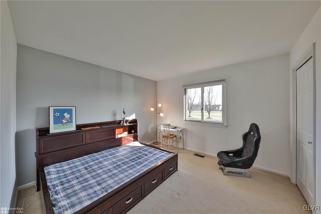 667 Bower Road Nazareth, PA 18064 - Photo 15 of 40 a bedroom with furniture and windows