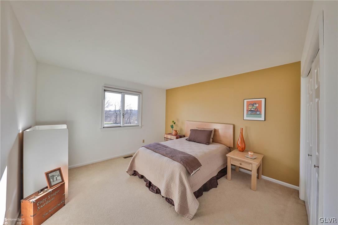 667 Bower Road Nazareth, PA 18064 - Photo 16 of 40 a bedroom with a bed and a window