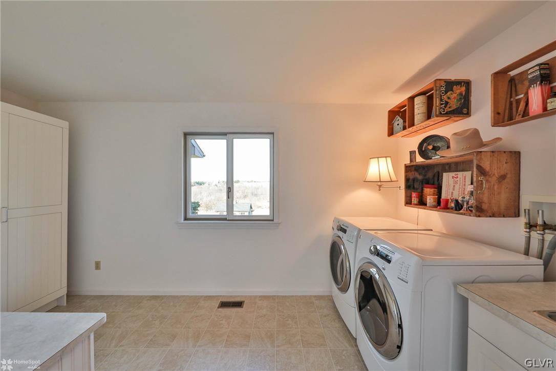 667 Bower Road Nazareth, PA 18064 - Photo 17 of 40 a utility room with dryer and washer