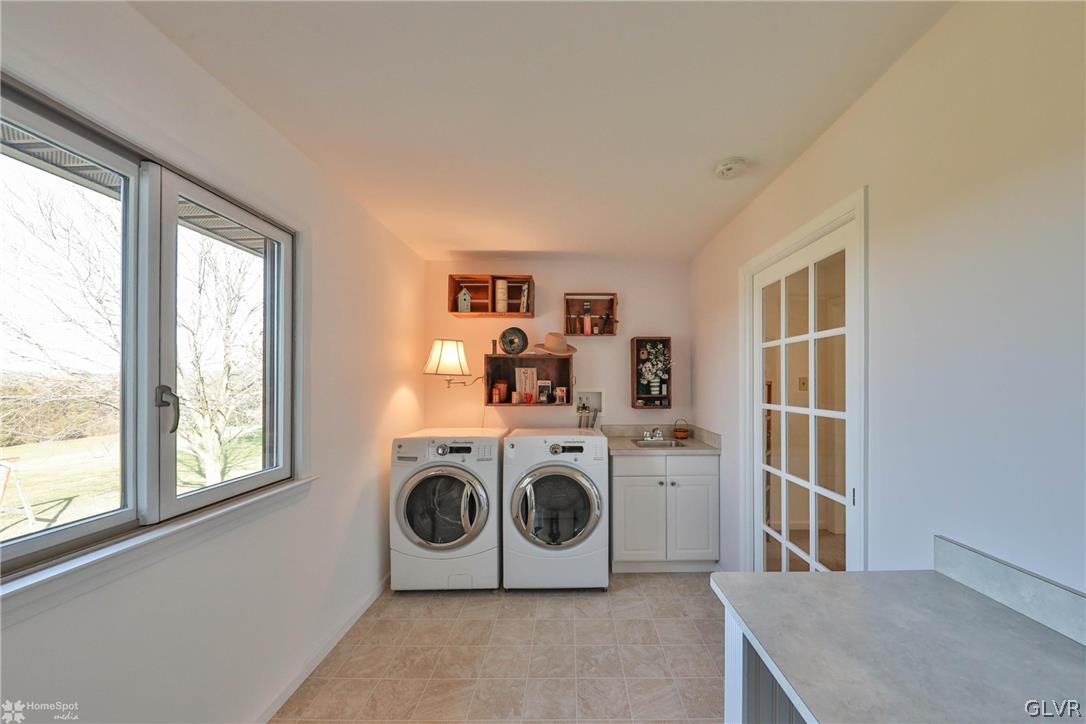 667 Bower Road Nazareth, PA 18064 - Photo 19 of 40 a utility room with dryer and washer