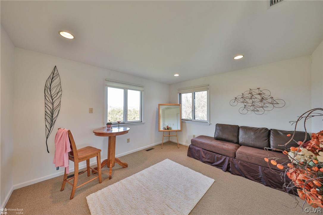 667 Bower Road Nazareth, PA 18064 - Photo 22 of 40 a living room with furniture and a large window