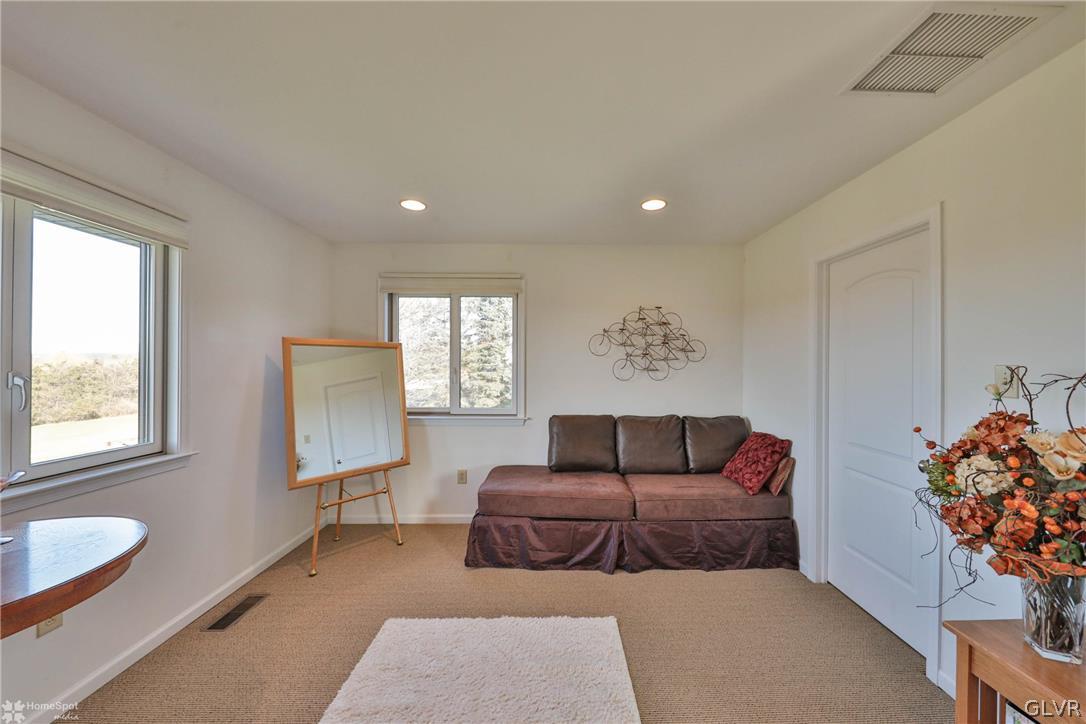 667 Bower Road Nazareth, PA 18064 - Photo 23 of 40 a living room with furniture and a window