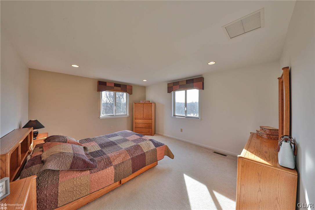 667 Bower Road Nazareth, PA 18064 - Photo 24 of 40 a bedroom with a bed and window