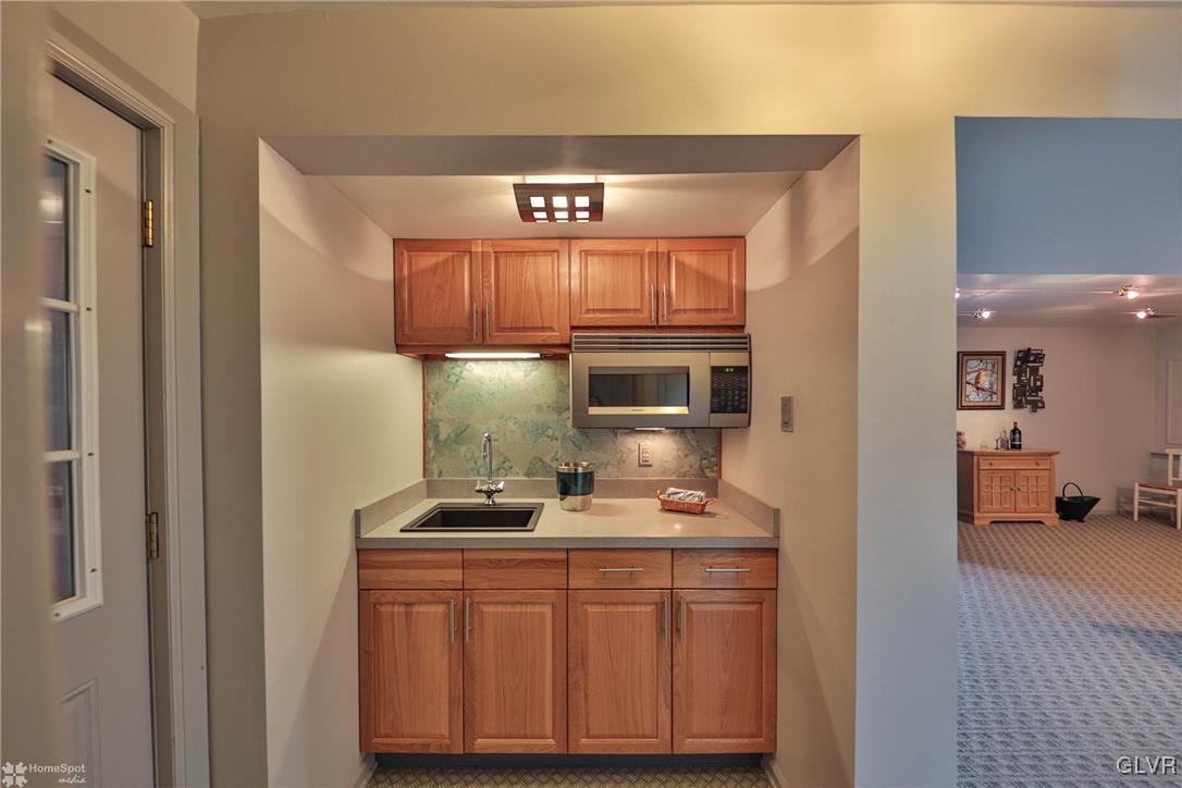 667 Bower Road Nazareth, PA 18064 - Photo 26 of 40 a kitchen with stainless steel appliances a refrigerator and stove