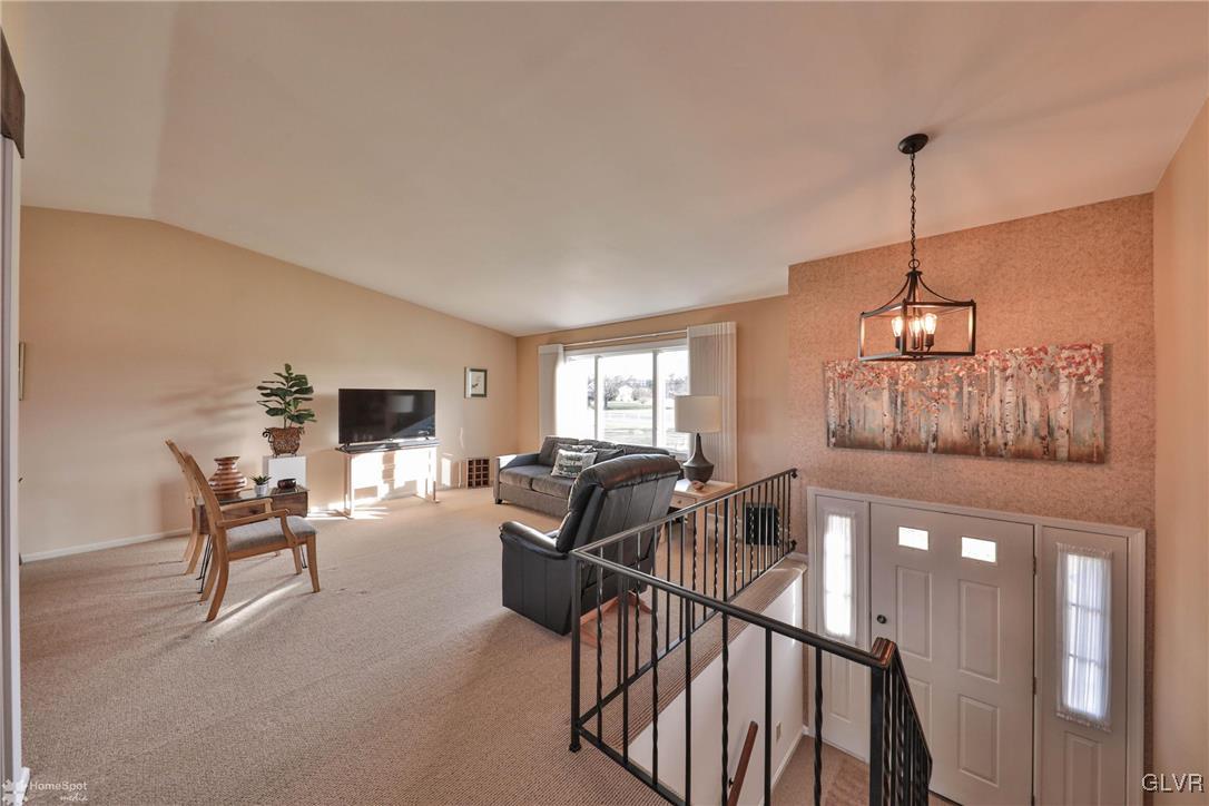 667 Bower Road Nazareth, PA 18064 - Photo 6 of 40 a living room with furniture and a flat screen tv