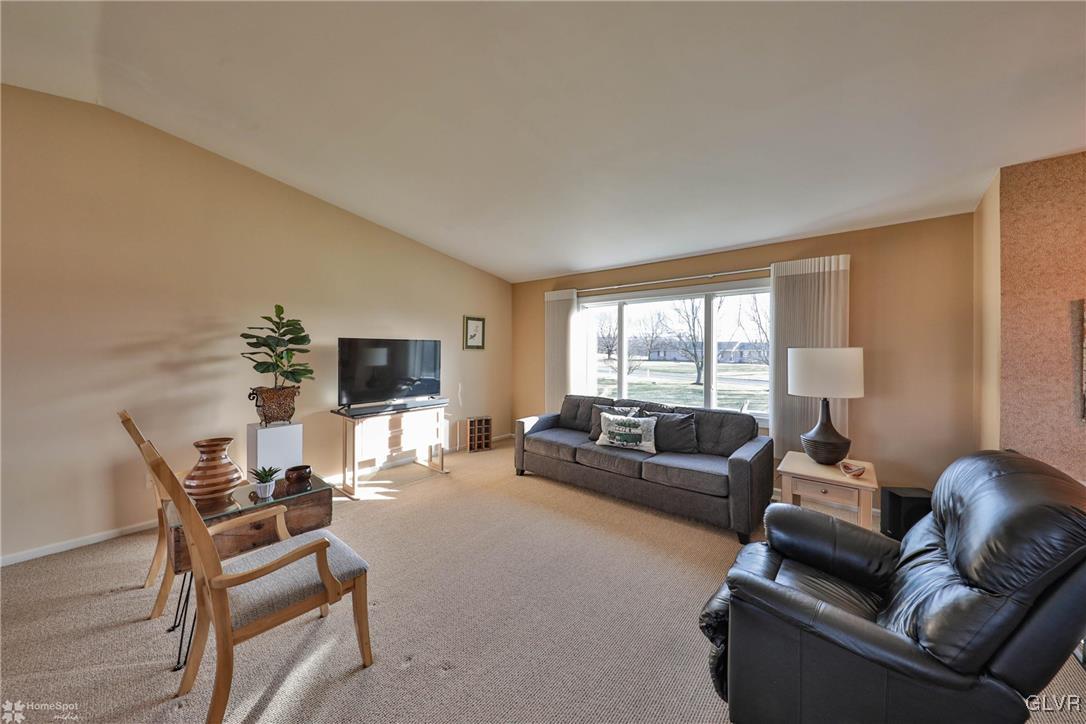667 Bower Road Nazareth, PA 18064 - Photo 7 of 40 a living room with furniture and a large window