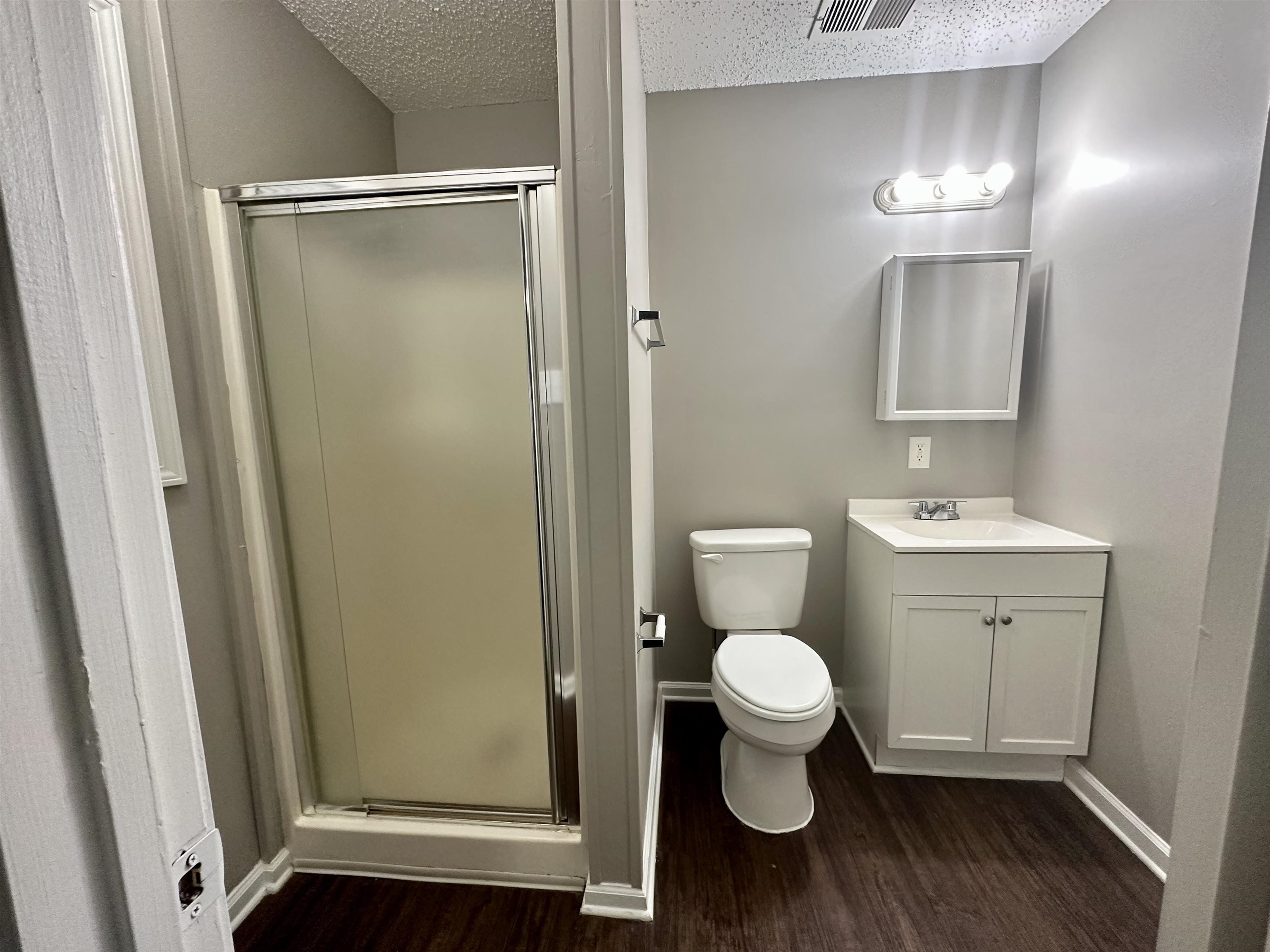 296 Glencoe Road Memphis, TN 38109 - Photo 10 of 18 a bathroom with a toilet and a sink