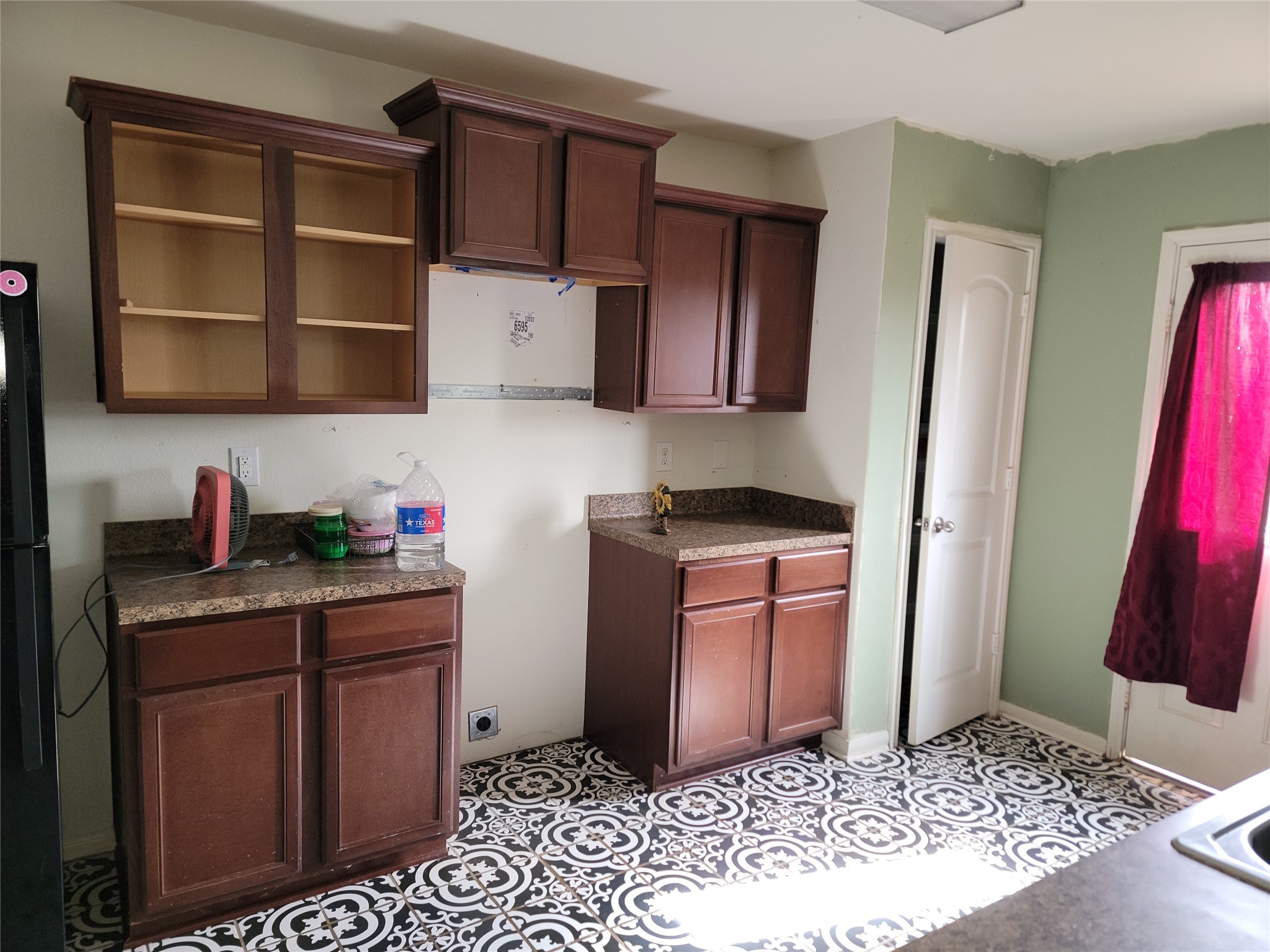 6030 Horizon Sky Road Cove, TX 77523 - Photo 3 of 12 a kitchen with stainless steel appliances granite countertop a refrigerator and a sink