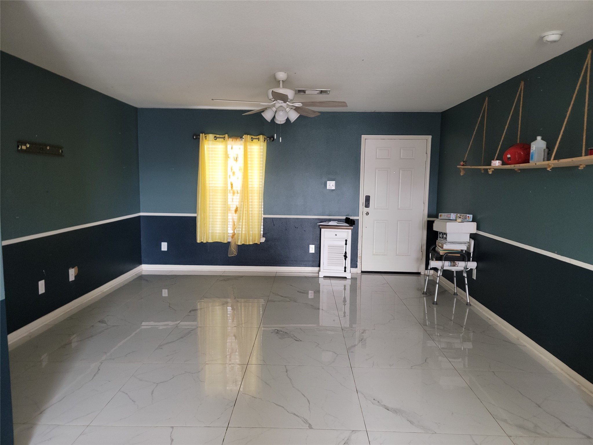 6030 Horizon Sky Road Cove, TX 77523 - Photo 5 of 12 a view of a livingroom with a staircase