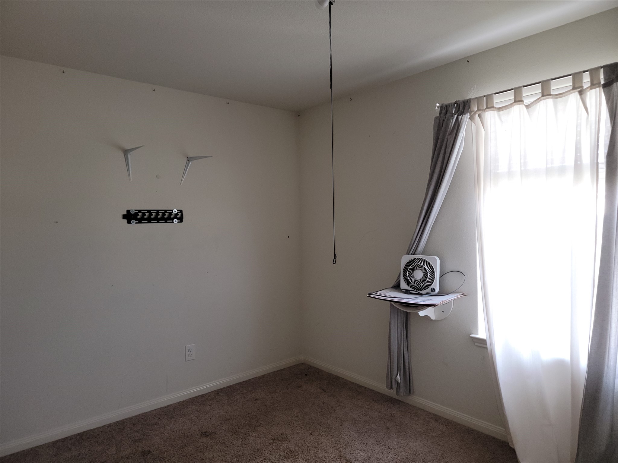 6030 Horizon Sky Road Cove, TX 77523 - Photo 8 of 12 a view of walk in closet with window