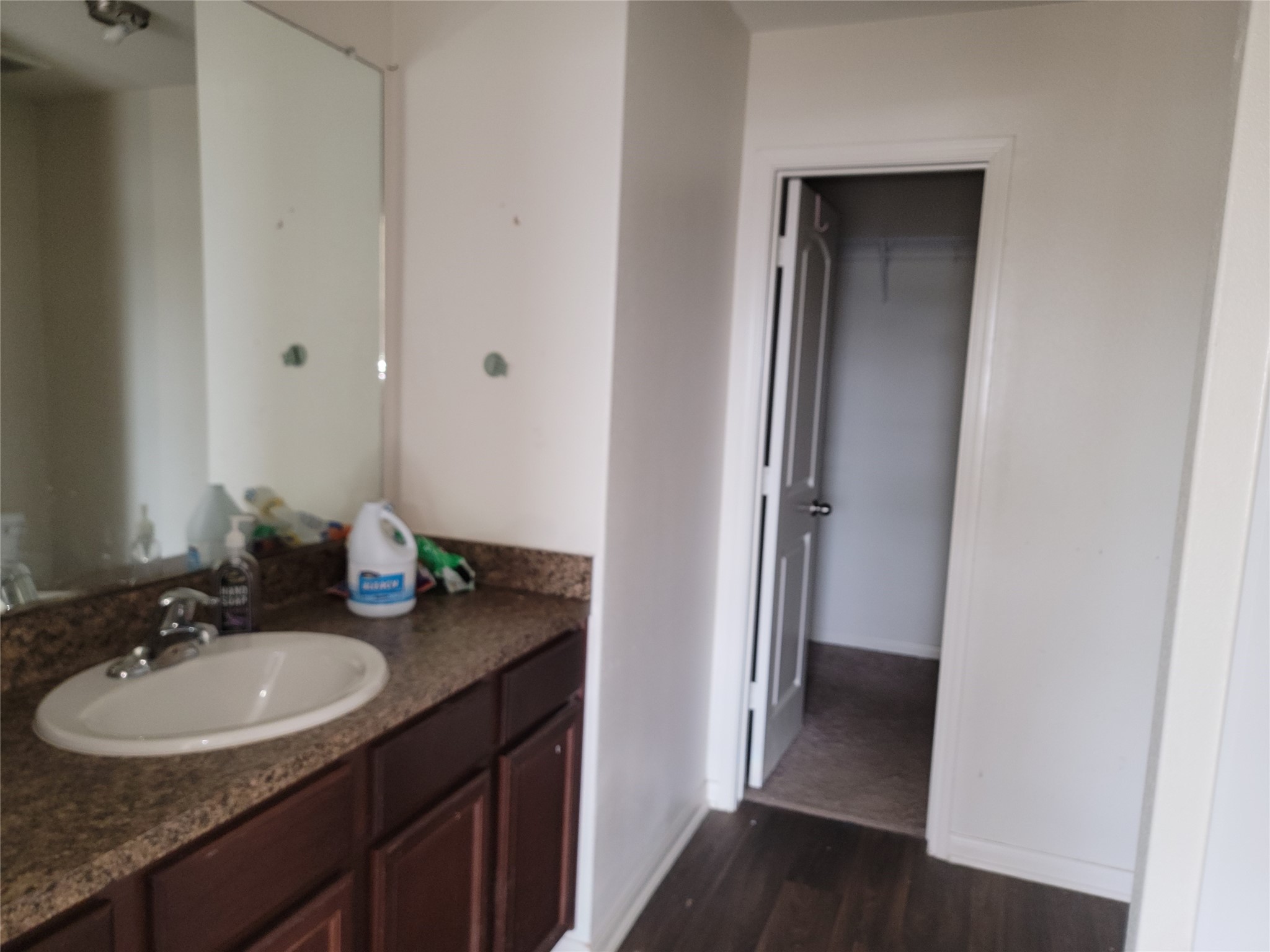 6030 Horizon Sky Road Cove, TX 77523 - Photo 10 of 12 a bathroom with a sink and a mirror