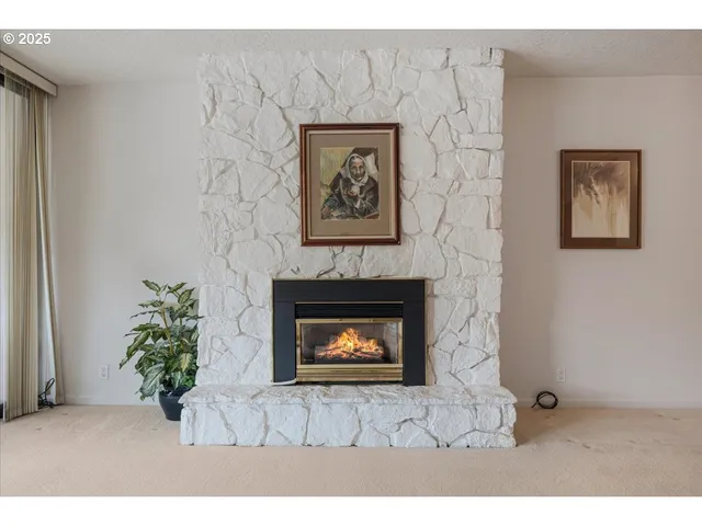 a stone house with a fireplace in it