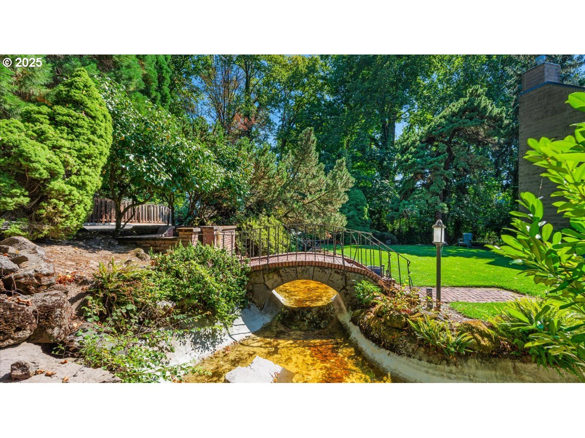 790 Southeast Webber Street, Unit 305 Portland, OR 97202 - Photo 5 of 30 a view of a backyard with plants
