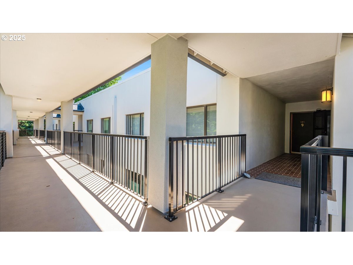 790 Southeast Webber Street, Unit 305 Portland, OR 97202 - Photo 9 of 30 a black and white photo of a living room