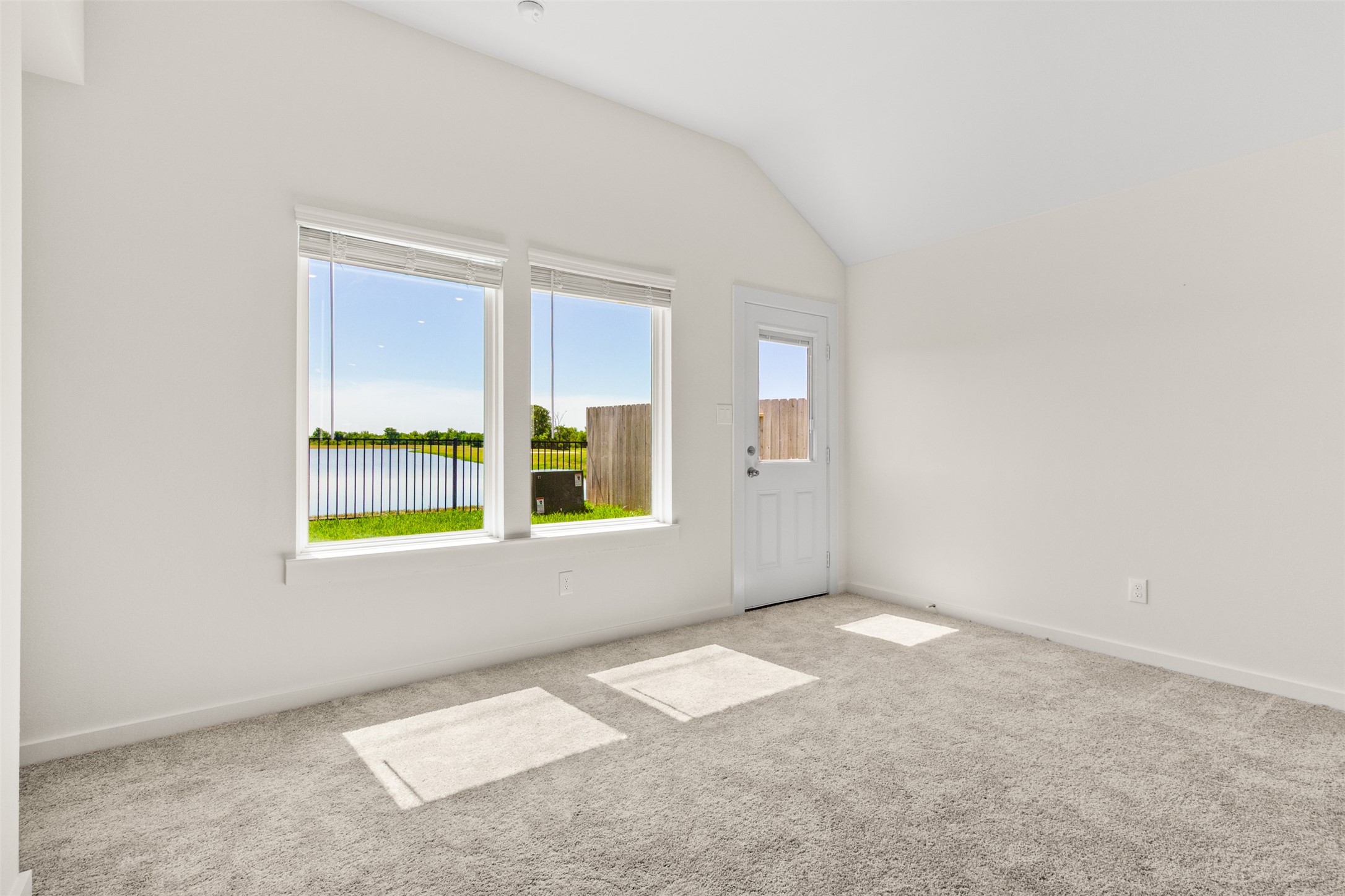 6643 Escondido Drive Rosharon, TX 77583 - Photo 10 of 25 an empty room with windows