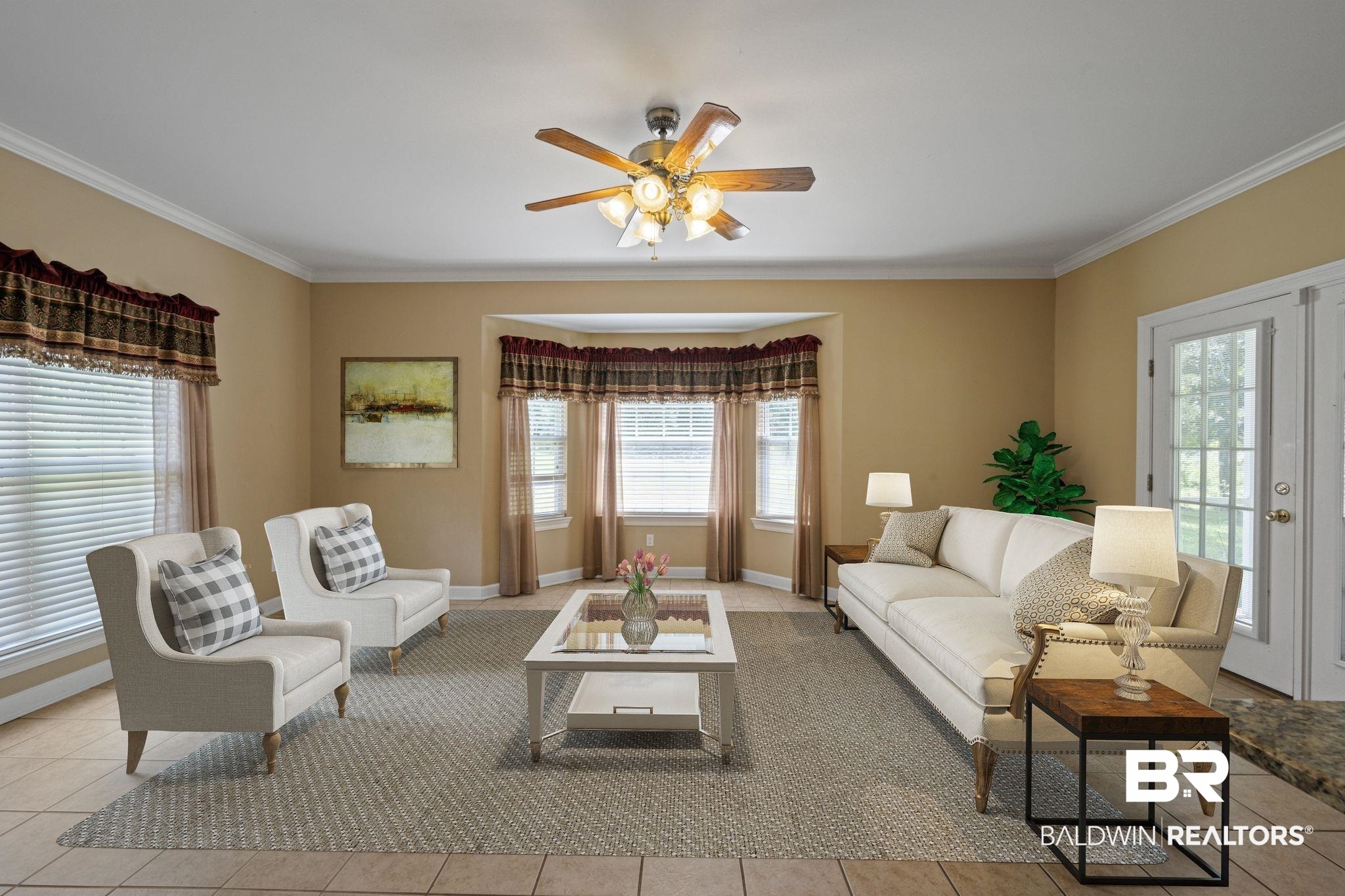 5618 Leytham Road Theodore, AL 36582 - Photo 23 of 60 Tiled living room with ceiling fan and ornamental molding