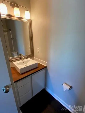 a bathroom with a bathtub and a toilet
