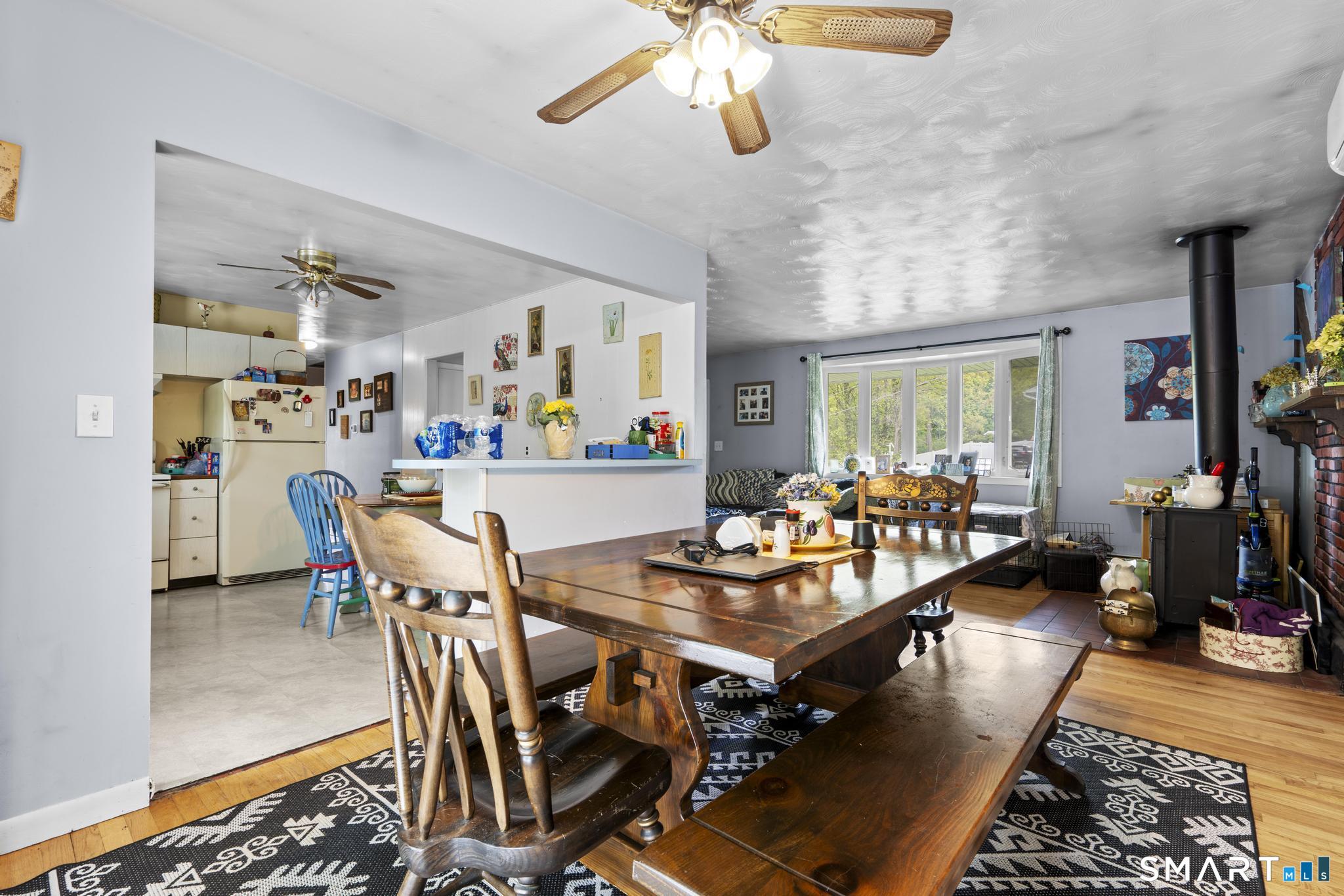 79 Forest View Drive Wolcott, CT 06716 - Photo 13 of 28 a view of a dining room with furniture