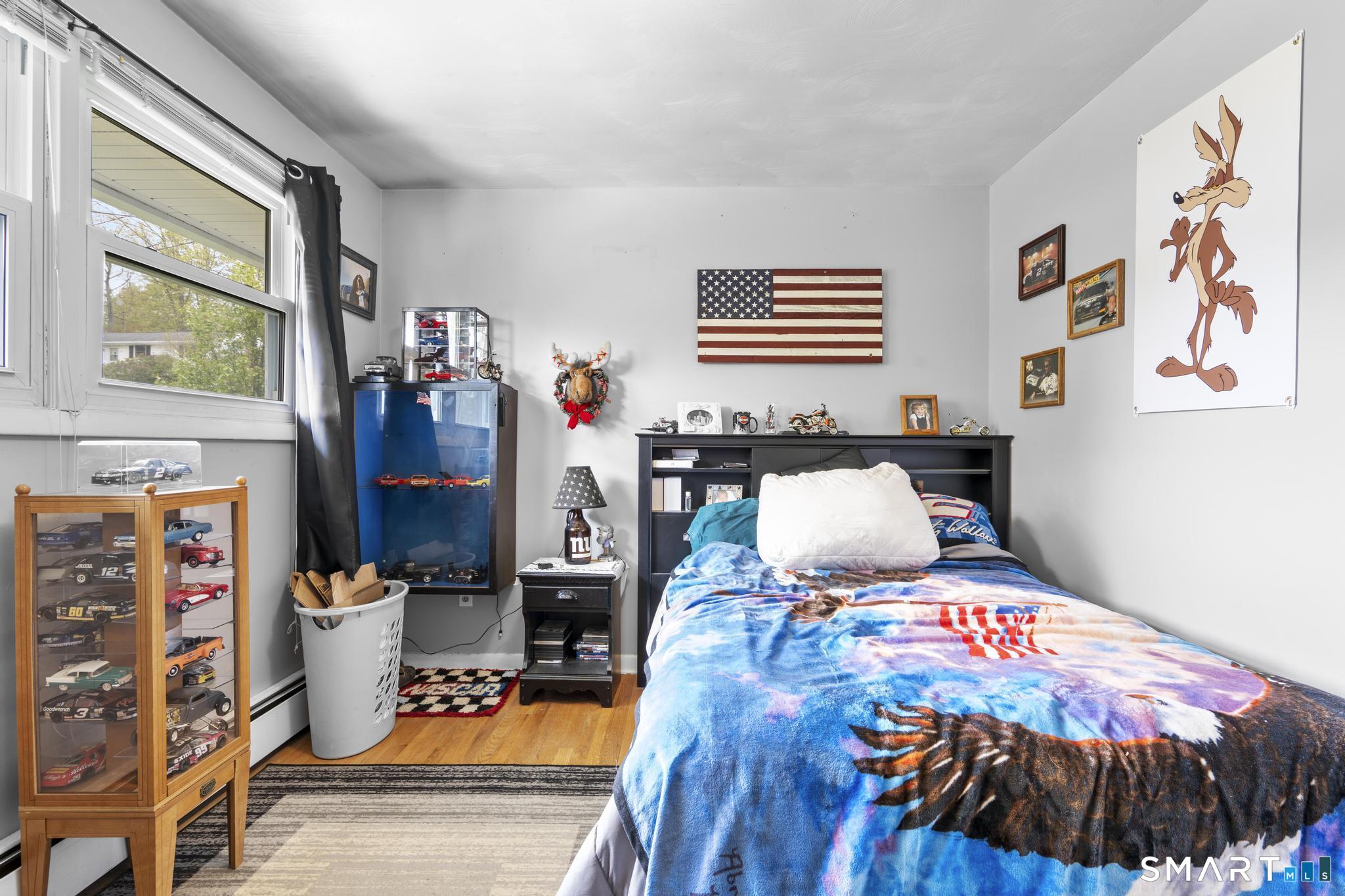 79 Forest View Drive Wolcott, CT 06716 - Photo 20 of 28 a bed room with a bed and a window