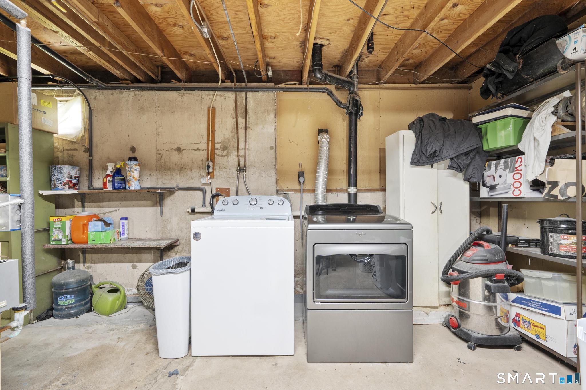 79 Forest View Drive Wolcott, CT 06716 - Photo 27 of 28 a utility room with dryer and washer