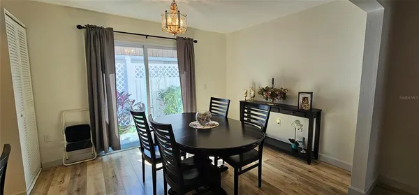 a living room with furniture and flat screen tv