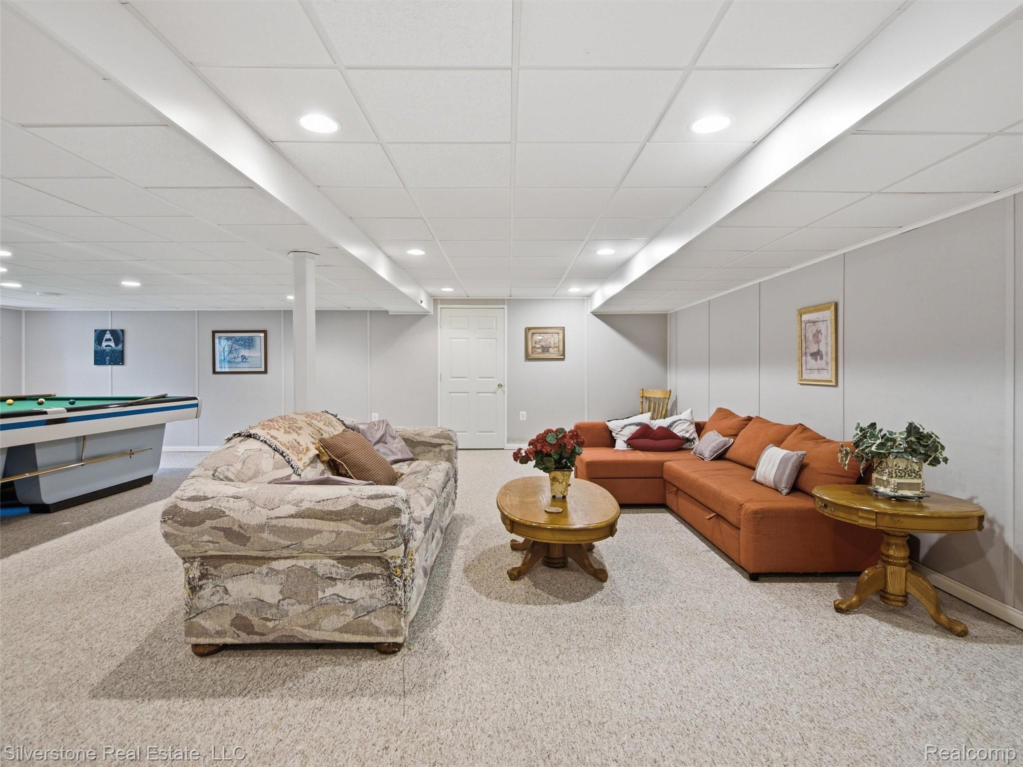 6577 Edith Court Troy, MI 48085 - Photo 45 of 61 Spacious recreational room featuring light-toned carpeting throughout and recessed lighting