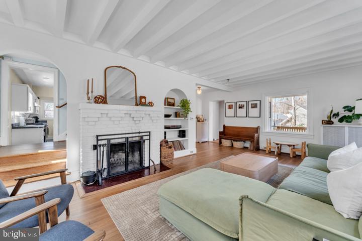 2300 Crest Road Baltimore, MD 21209 - Photo 7 of 46 a living room with furniture and a fireplace