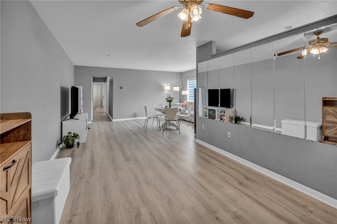 5200 Royalton Road, Unit 9B North Royalton, OH 44133 - Photo 5 of 27 Living area featuring ceiling fan and light wood-type flooring
