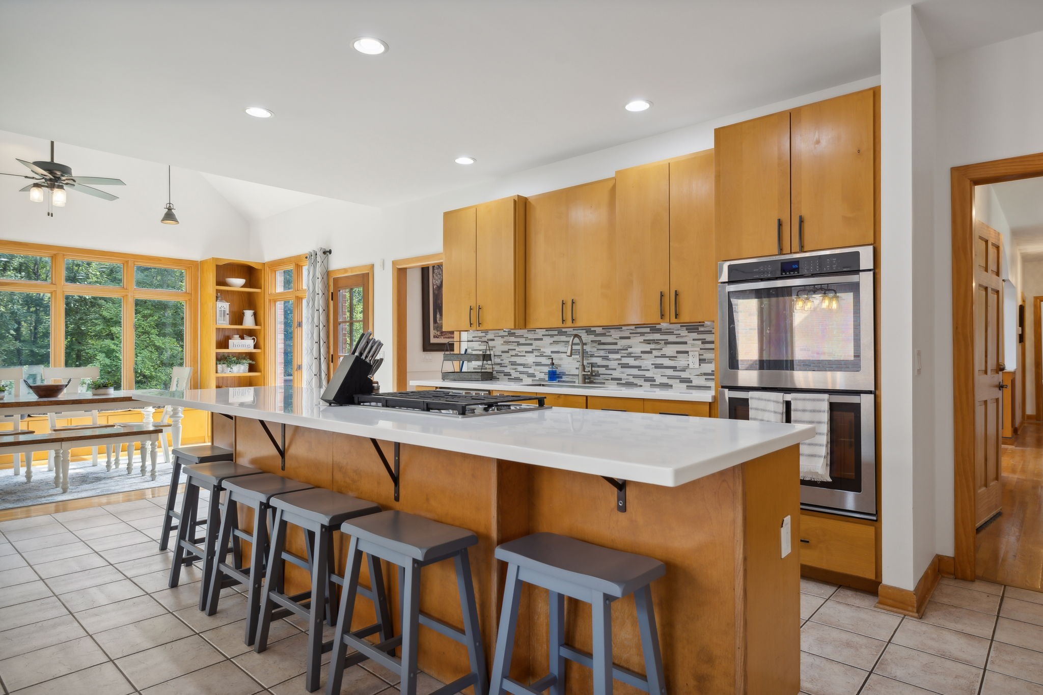 1208 Davidson Lane Columbia, TN 38401 - Photo 29 of 85 a kitchen with kitchen island granite countertop wooden cabinets and stainless steel appliances