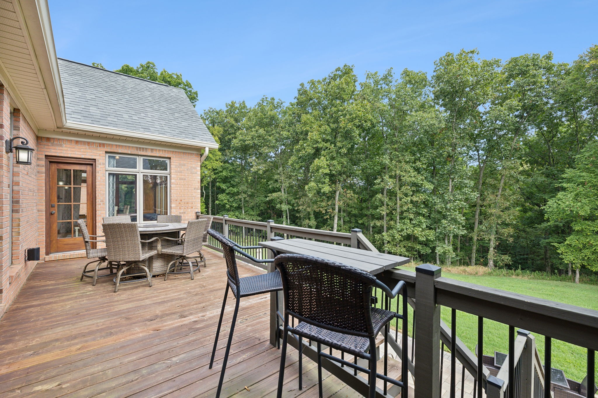 1208 Davidson Lane Columbia, TN 38401 - Photo 66 of 85 a view of a patio with table and chairs with wooden floor and fence