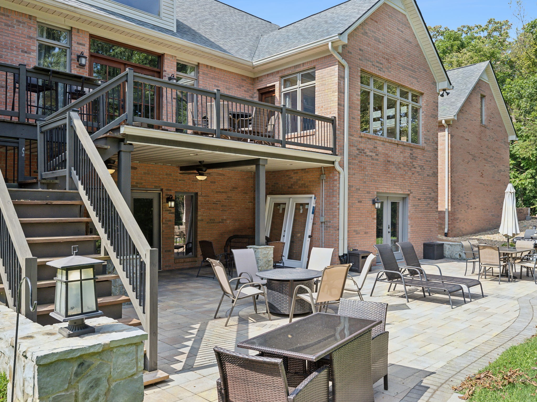1208 Davidson Lane Columbia, TN 38401 - Photo 69 of 85 a view of a patio with couches table and chairs with wooden floor and fence