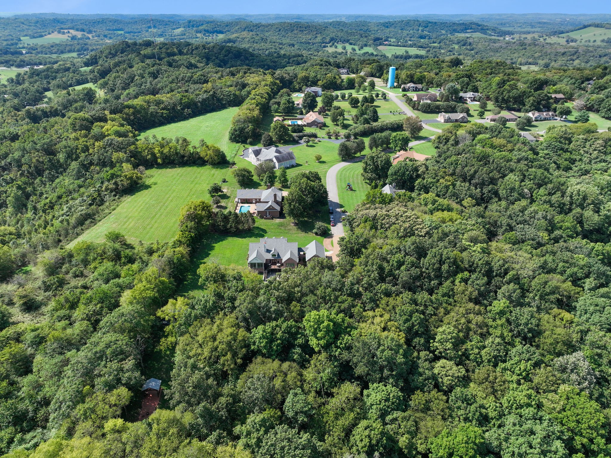 1208 Davidson Lane Columbia, TN 38401 - Photo 82 of 85 an aerial view of a forest with houses